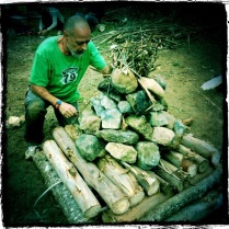 Carlos heats these stones in the fire and place them in the central pit inside the Temazcal
